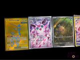 several pokemon cards are lined up in a row on a black background