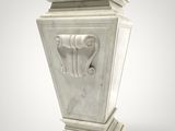 an image of a white marble urn with a heart on it