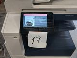a photo of a multi - function printer in a warehouse