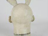 an image of a sculpture of a head with two hands on it
