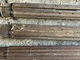 four pieces of wood that are laying on the ground