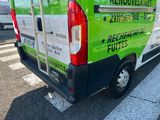 a van that is parked on the side of the road