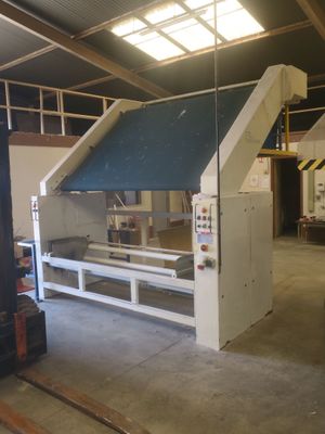 a large machine that is sitting inside of a building
