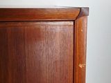 an image of a close up of a wooden cabinet in a room
