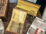 many different types of knives and knives in a case