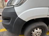 a white van parked on the side of the street