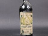 a bottle of wine that is sitting on a table