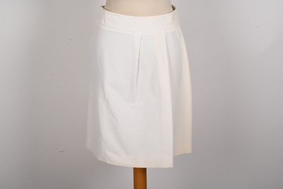an image of a white skirt on a mannequin stand