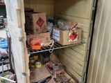 a small refrigerator that has a lot of food inside of it