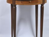 une image représentant une table en bois sur laquelle est posé un plateau