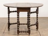 an image of a table with a wooden top on a wooden floor