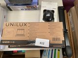 a box with a computer on top of it on a desk