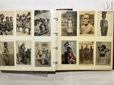 an open book with pictures of african people and people on it