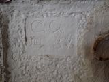 a picture of a close up of a sign on a wall