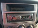 a radio in the center of a car with buttons on it