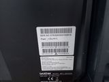 a close up of a printer with a bar code on it