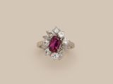 a ruby and diamond cluster ring