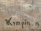 a painting on the wall of a building that says kompin 9