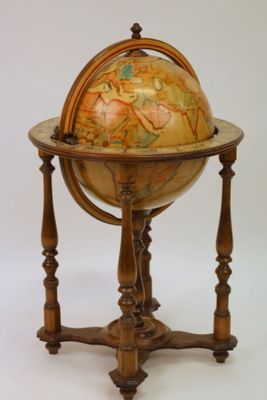 a wooden stand with a globe on it on a white background