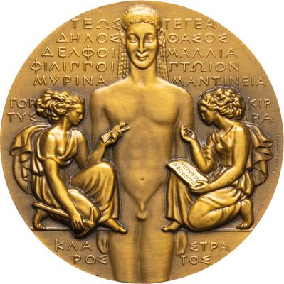 a close up of a gold medal with a woman and two men