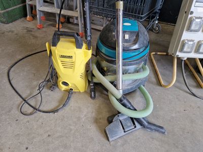 two vacuums that are sitting next to each other on the floor