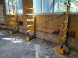 a yellow scaffolding on the side of a building