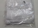 a pile of folded towels in a plastic bag