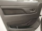 a car door with the door handle open and the door handle down