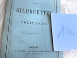 un livre bleu posé sur une nappe blanche