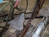 many old bicycles that are sitting in a garage