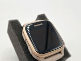 a smart watch sitting on top of a stand