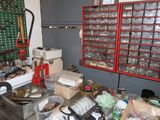 a table with many items on it in a room