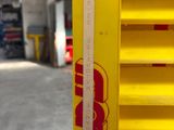 a yellow shelf with a red top and a red bottom