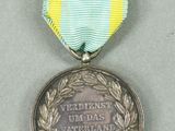 medal with ribbon around the neck of a medal with a ribbon around the neck of a medal with a ribbon around the neck of a medal with a ribbon around the