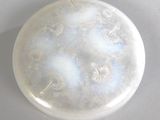 a picture of a white object on a table