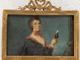 tableau représentant une femme tenant un oiseau dans la main