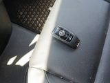 a remote control in the back seat of a car