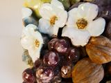 a close up of a bunch of grapes and nuts