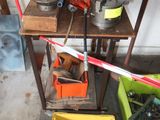 many tools that are sitting on a shelf in a room