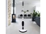 a white and black mop sitting on top of a hard wood floor