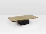 une table en bois avec un piètement noir et un plateau blanc