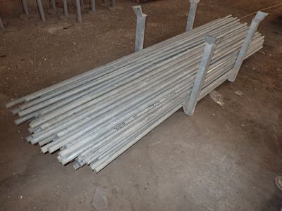 a pile of steel rods sitting on the ground