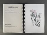 a book with a drawing of a woman in a dress