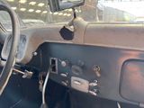 a steering wheel and dashboard of a car with an apple logo on it