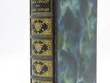 the front cover of a book with gold trimmings on it