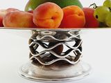 a bowl of fruit that is sitting on a table