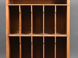 an image of a wooden bookcase with six shelves on each side