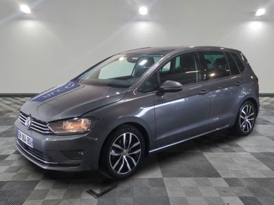 the volkswagen e - golf is parked on a checkered tile floor