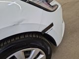 a close up of a car ' s front bumper