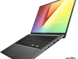 the asus vivobook 15 laptop is open and ready to use
